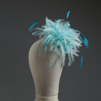 Ladies wedding or races aqua and turquoise small feather and satin loop fascinator hat