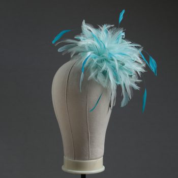 Ladies wedding or races aqua and turquoise small feather and satin loop fascinator hat