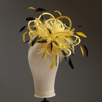 Ladies formal yellow and black medium feather and satin loop fascinator hat. Suitable for a wedding or ladies day at the races