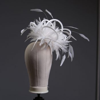 Ladies formal Ivory medium feather and satin loop fascinator hat. Suitable for a wedding or ladies day at the races