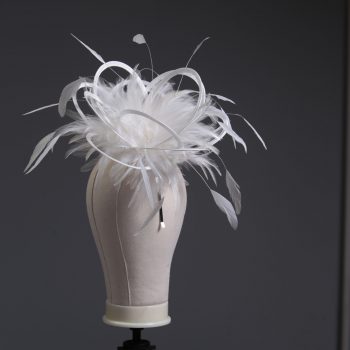 Ladies formal Ivory medium feather and satin loop fascinator hat. Suitable for a wedding or ladies day at the races