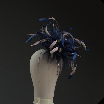 Ladies' formal Navy Blue and Taupe Nude medium feather and satin loop fascinator hat. Suitable for a wedding or ladies' day at the races