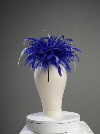 Ladies' formal royal blue and baby blue medium feather and satin loop fascinator hat. Suitable for a wedding or ladies' day at the races