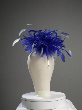 Ladies' formal royal blue and baby blue medium feather and satin loop fascinator hat. Suitable for a wedding or ladies' day at the races