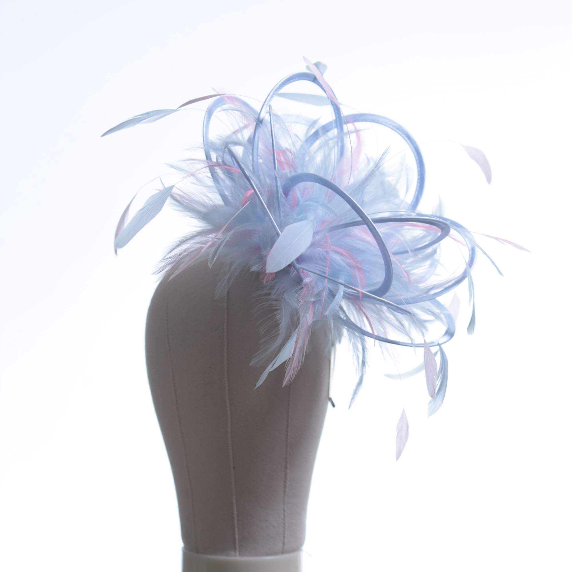 Ladies formal Baby Blue and Baby Pink Medium sized feather and satin fascinator hat. Suitable for a wedding or ladies day at the races