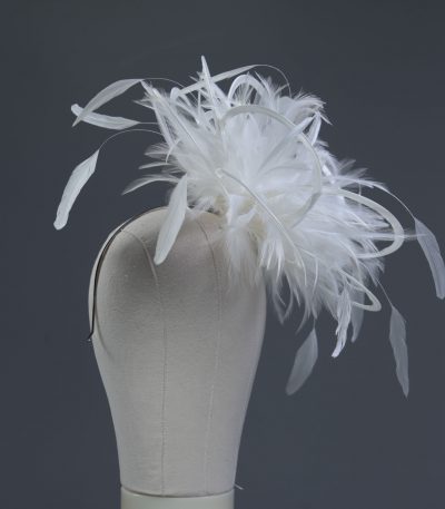 Ladies formal Ivory medium feather and satin loop fascinator hat. Suitable for a wedding or ladies day at the races